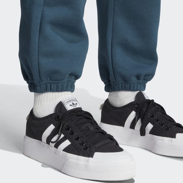 Adidas Stan Smith All Black on Feet 