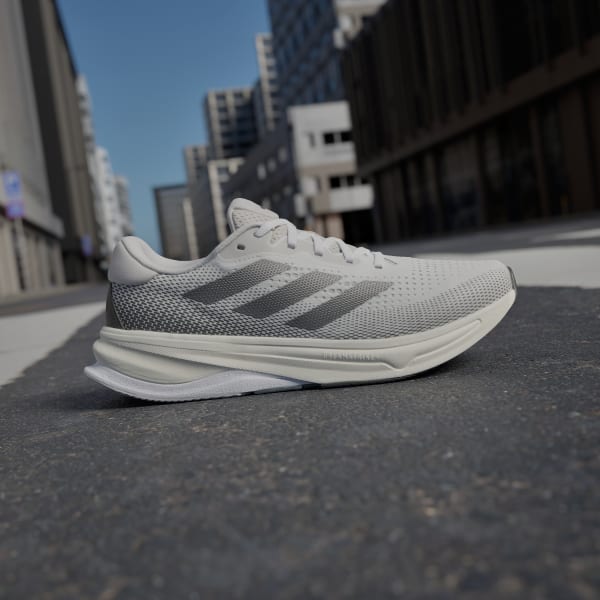 White Supernova Solution Running Shoes