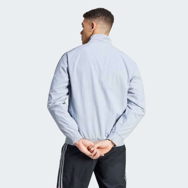 Adidas originals hotsell woven track top