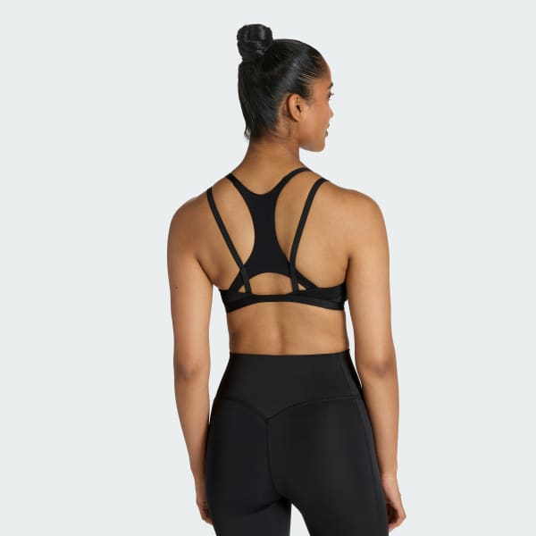 Negro Top deportivo de tiras con sujeción ligera Optime Workout