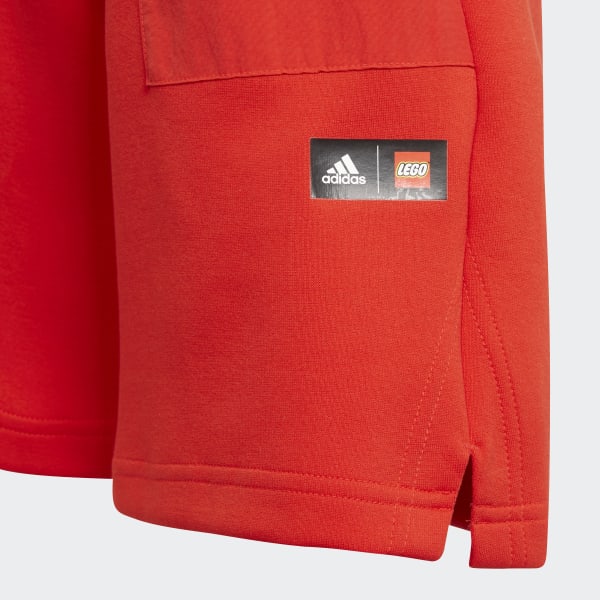 สีแดง กางเกงขาสั้นมีกระเป๋าซิป adidas x Classic LEGO® JEW02