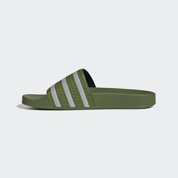 green and white adidas slides