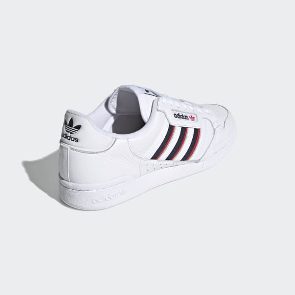 white adidas trainers with red stripes