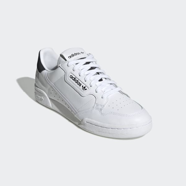 white retro adidas trainers