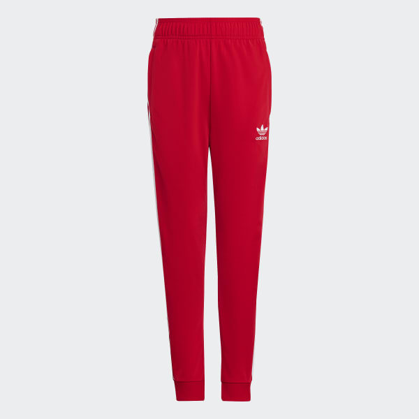 Women's red adidas track pants top