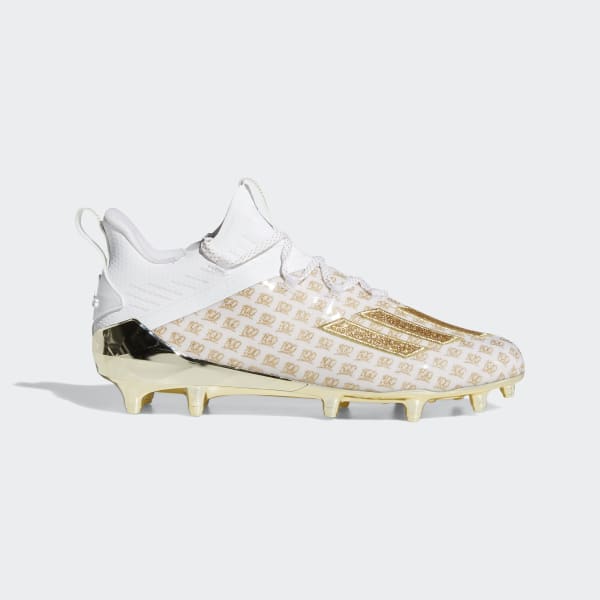 white and gold adidas cleats