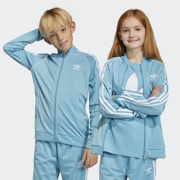 สีน้ำเงิน เสื้อแทรคแจ็คเก็ต Adicolor SST