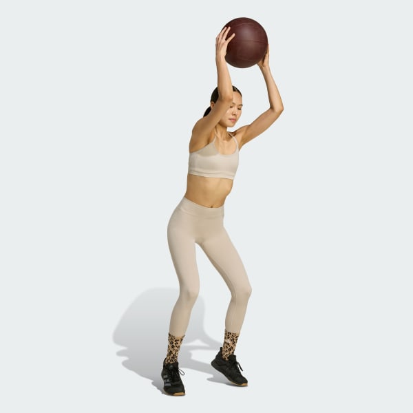 Beige top deportivo Workout Essentials con punto de sujeción ligera