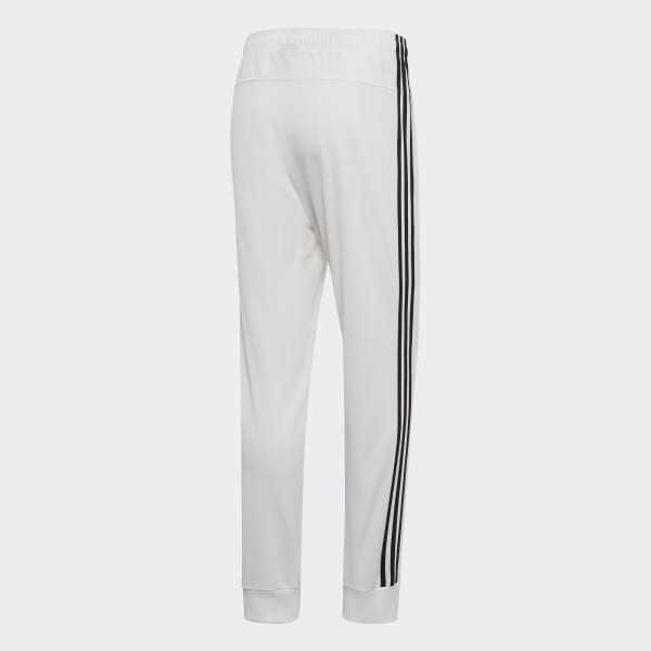 adidas Essentials 3-Stripes Tapered Tricot Pants - White | adidas Canada