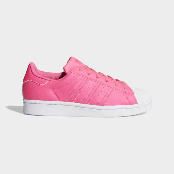 pink and white adidas superstars