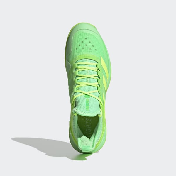 Adidas green tennis shoes top