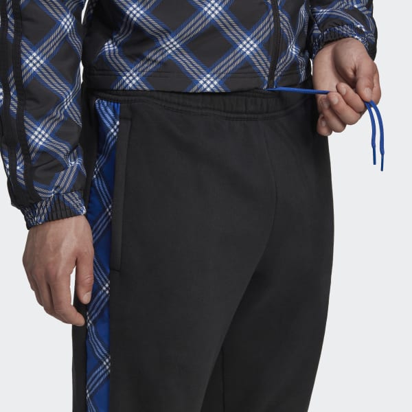 cerná Sportovní kalhoty Tiro Winterized NQ255