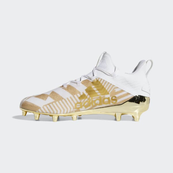 white and gold adidas football cleats