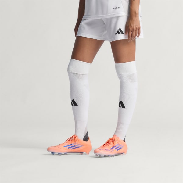 Orange F50 Elite Fußballschuh, feste Böden