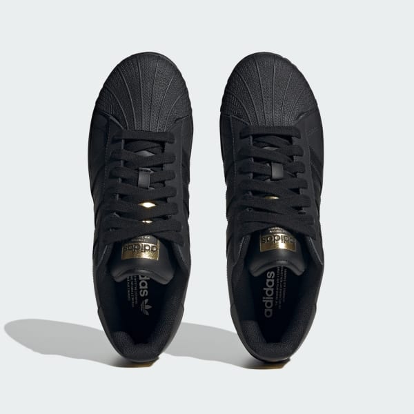 Adidas superstar mujer negras store y doradas