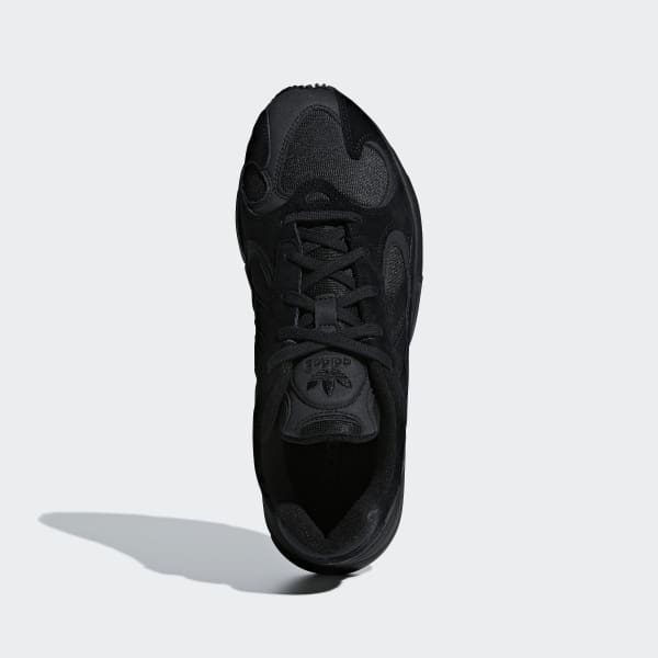 all black adidas yung 1s