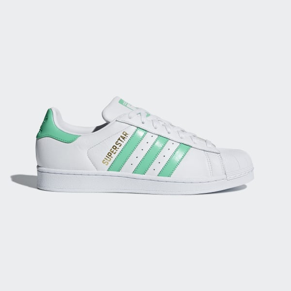 white and green adidas superstars