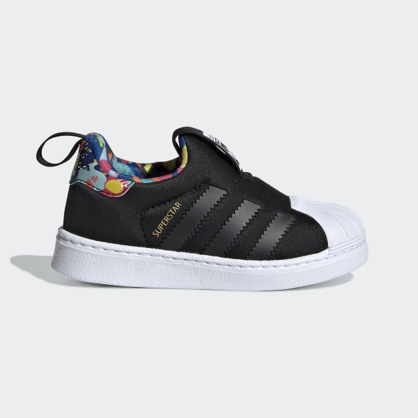white adidas superstar trainers