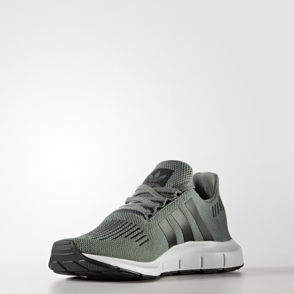 adidas green swift run trainers