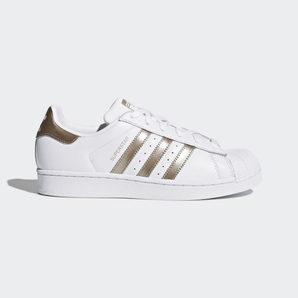 adidas white shoes with gold stripes