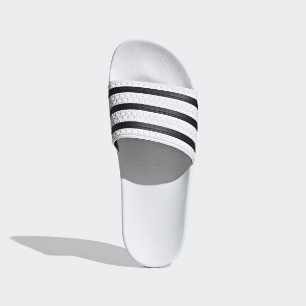 white adilette slides