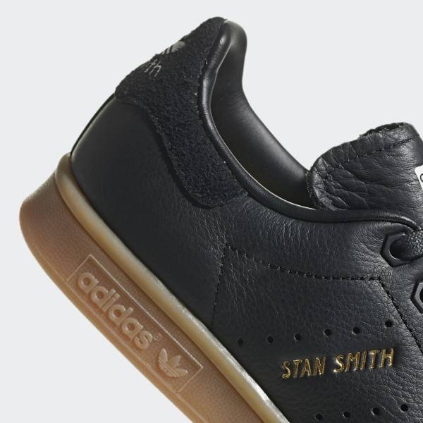 stan smith black gum sole