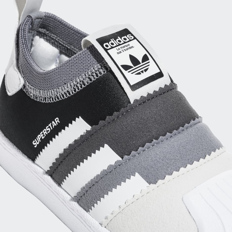 Marque aux 3 bandes. Адидас la marque aux 3 bandes. Adidas bandes. Адидас бандес кроссовки. Adidas la marque aux 3 bandes кроссовки с пунпонами.