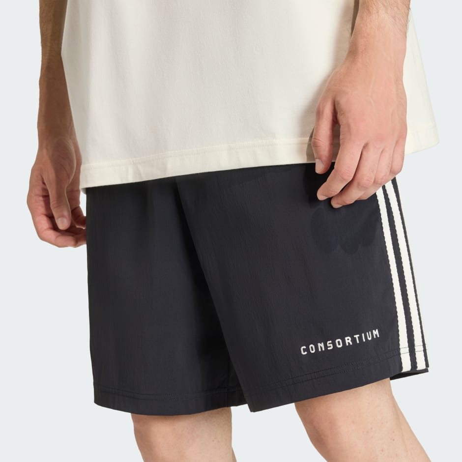 PANTALONI SCURȚI BY CONSORTIUM