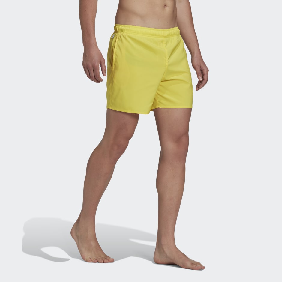 Clothing - Short Length Solid Swim Shorts - Yellow | adidas South Africa
