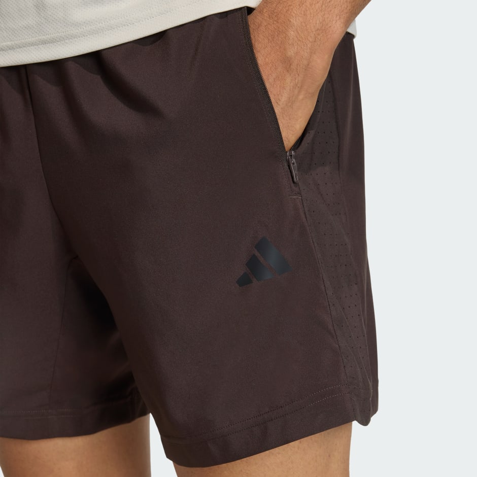 WORKOUT ESSENTIALS BASE WOVEN SHORT