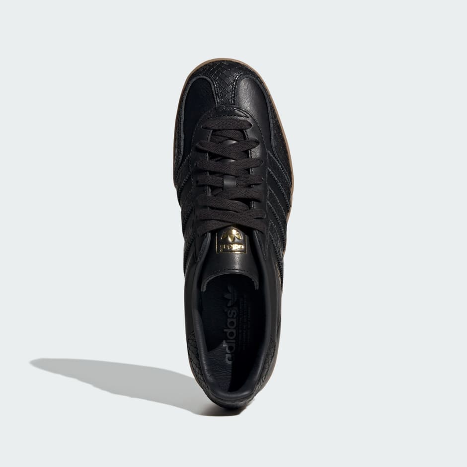 Adidas black sneakers with gold trim hotsell