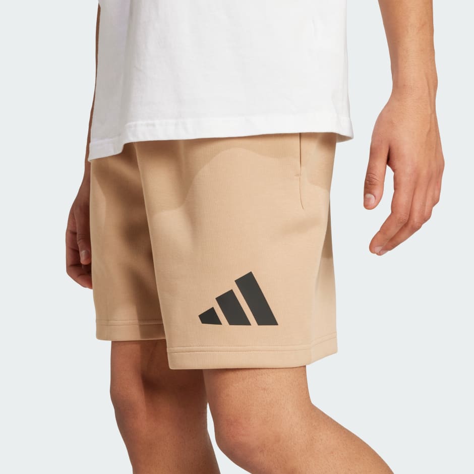 Clothing - Future Icons 3 Bar Logo Shorts - Brown | adidas Oman