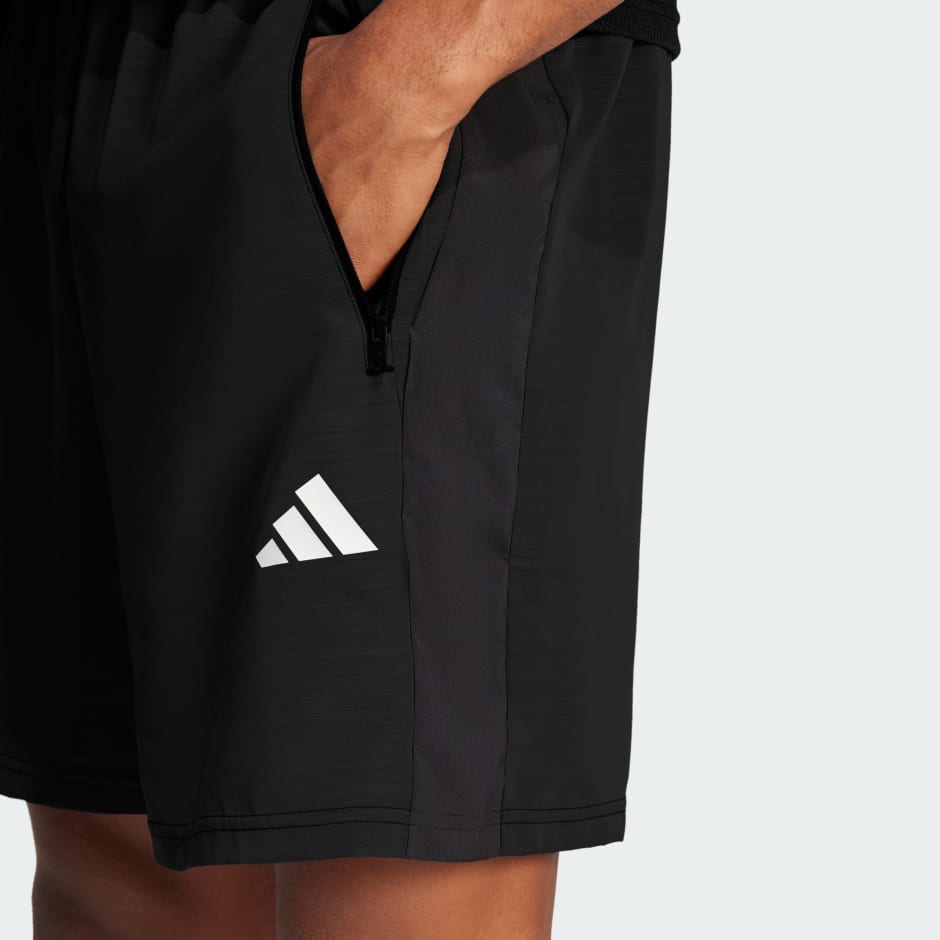 Train Essentials Woven M&eacute;lange Shorts