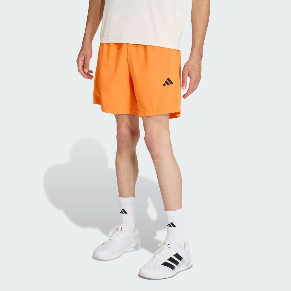 WORKOUT ESSENTIALS BASE WOVEN SHORT