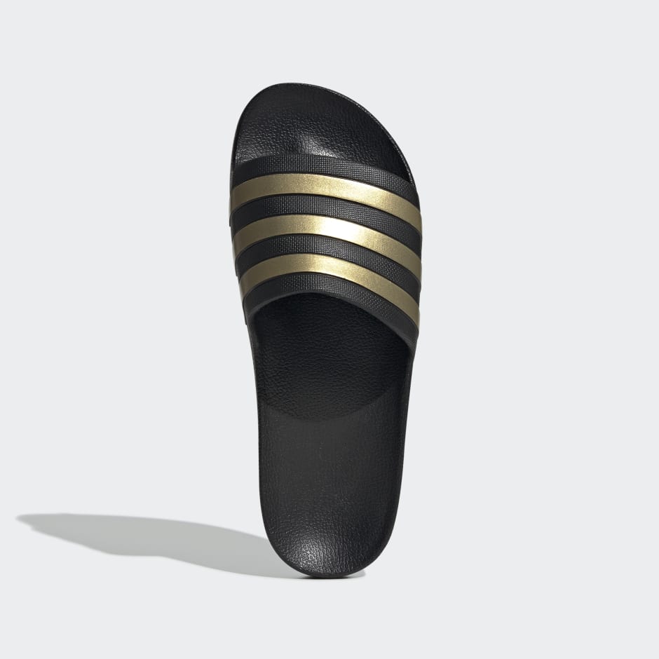 adilette aqua slides black and gold