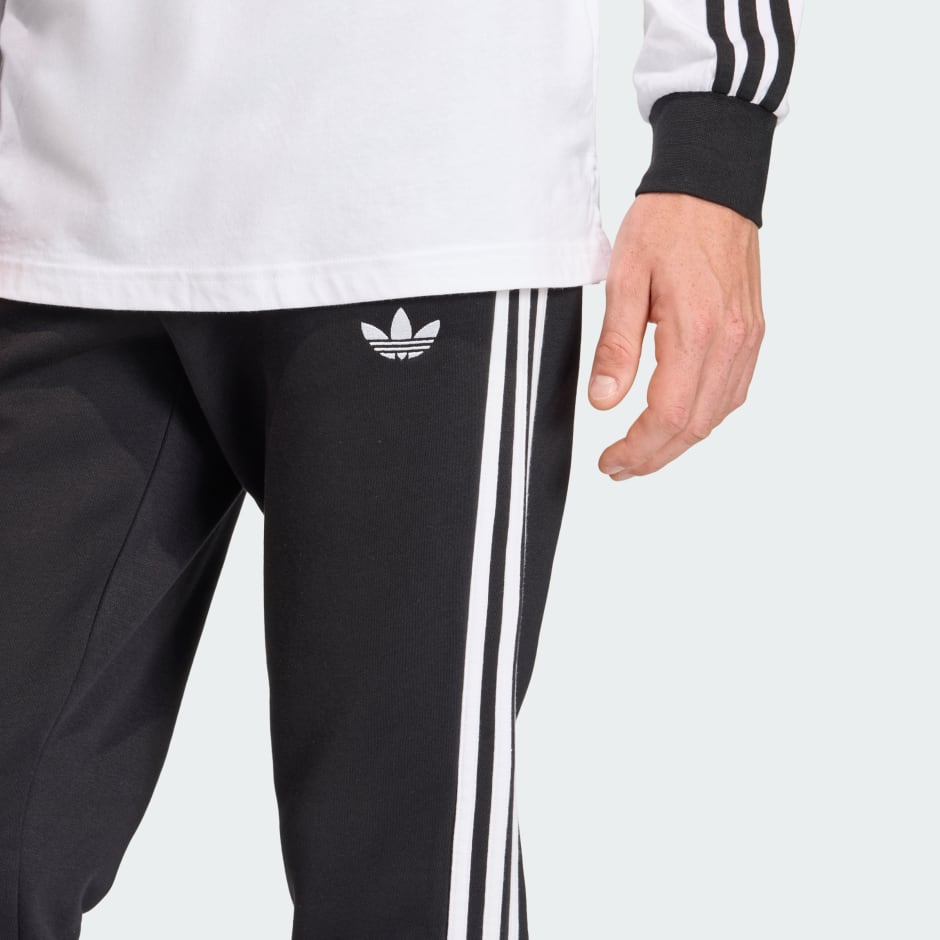 PANTALONI DE TRENING CU 3 DUNGI