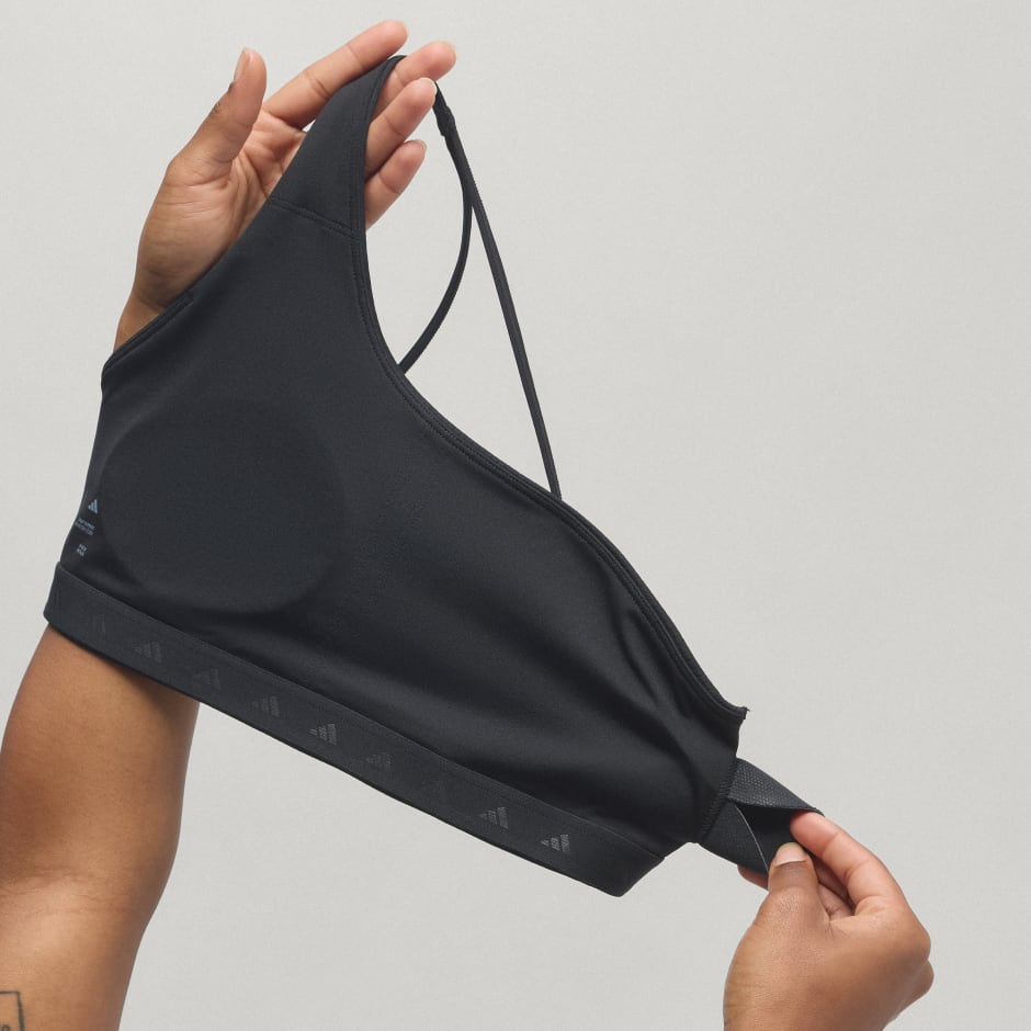 Sutien de antrenament Optime su striații, un umăr gol și susținere ușoară