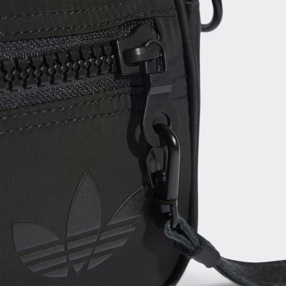 adidas Blue Version Mini Airliner Clutch - Black | adidas UAE