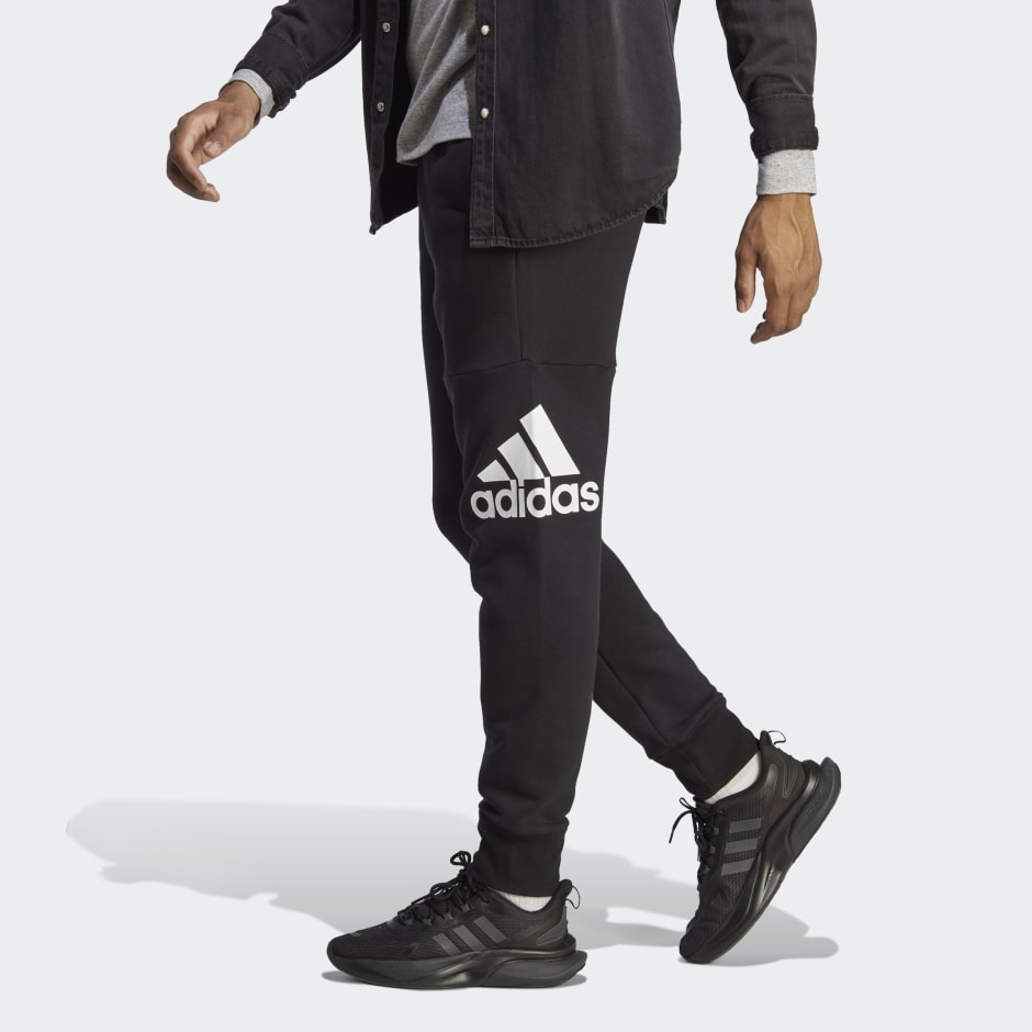 adidas Essentials French Terry Tapered Cuff Logo Pants - Black | adidas UAE