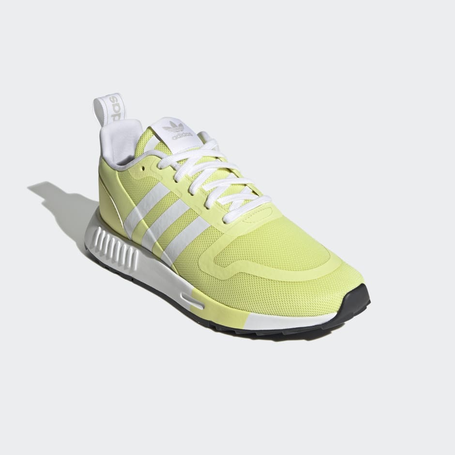 yellow striped adidas shoes