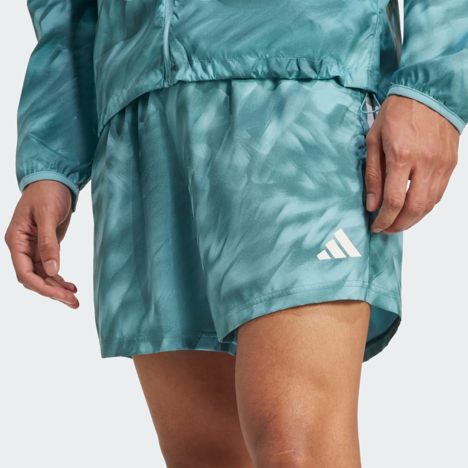 Own The Run Allover Print Shorts