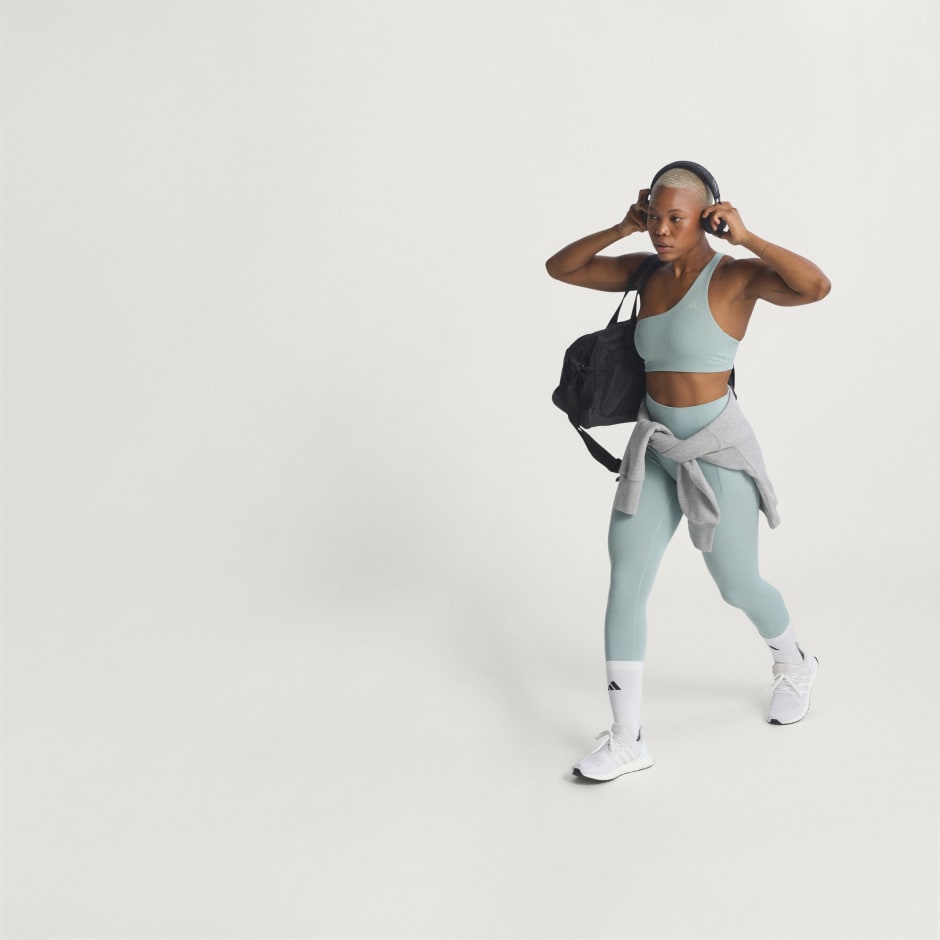 Sutien de antrenament Optime su striații, un umăr gol și susținere ușoară