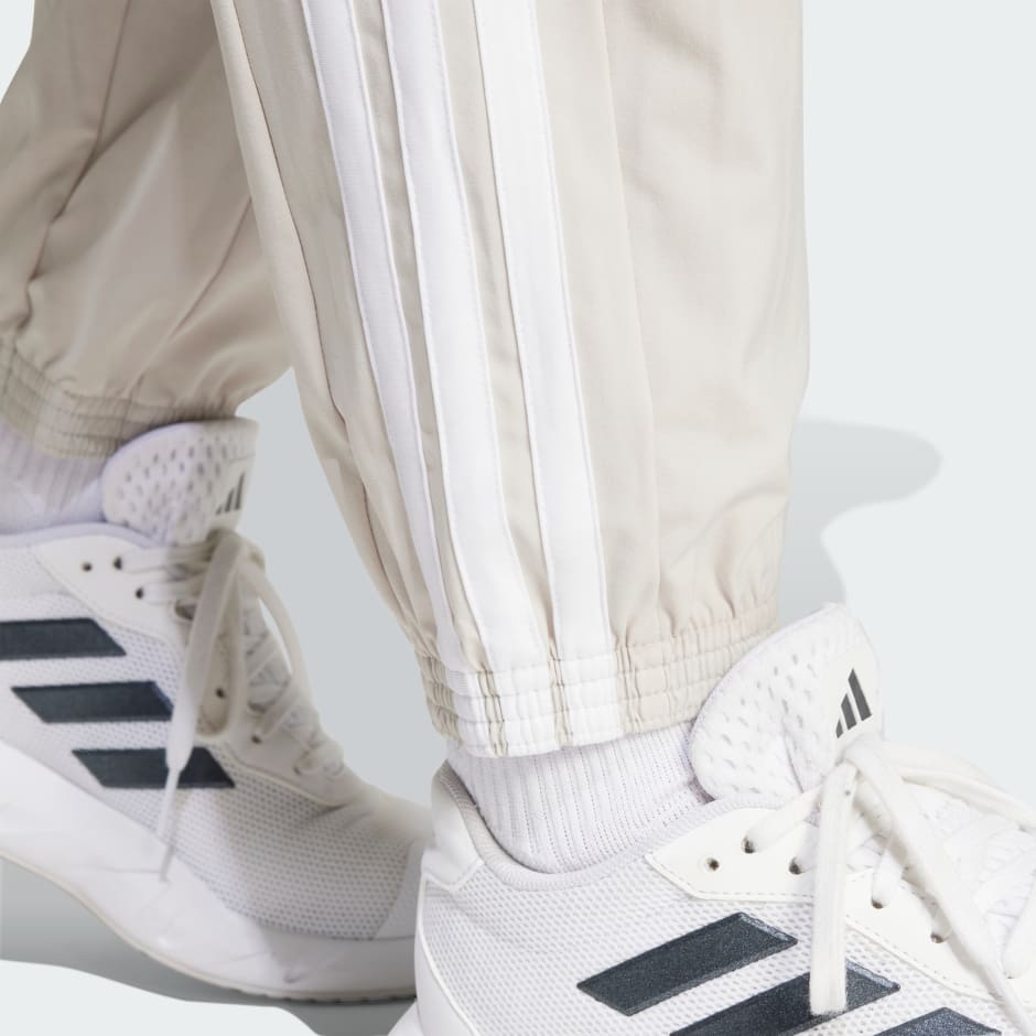 Train Essentials 3-Stripes Woven Pants