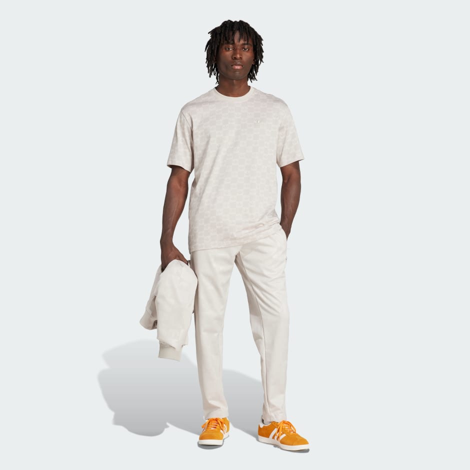 بنطال جري عادي مُوحّد اللون بطبعة كاملة