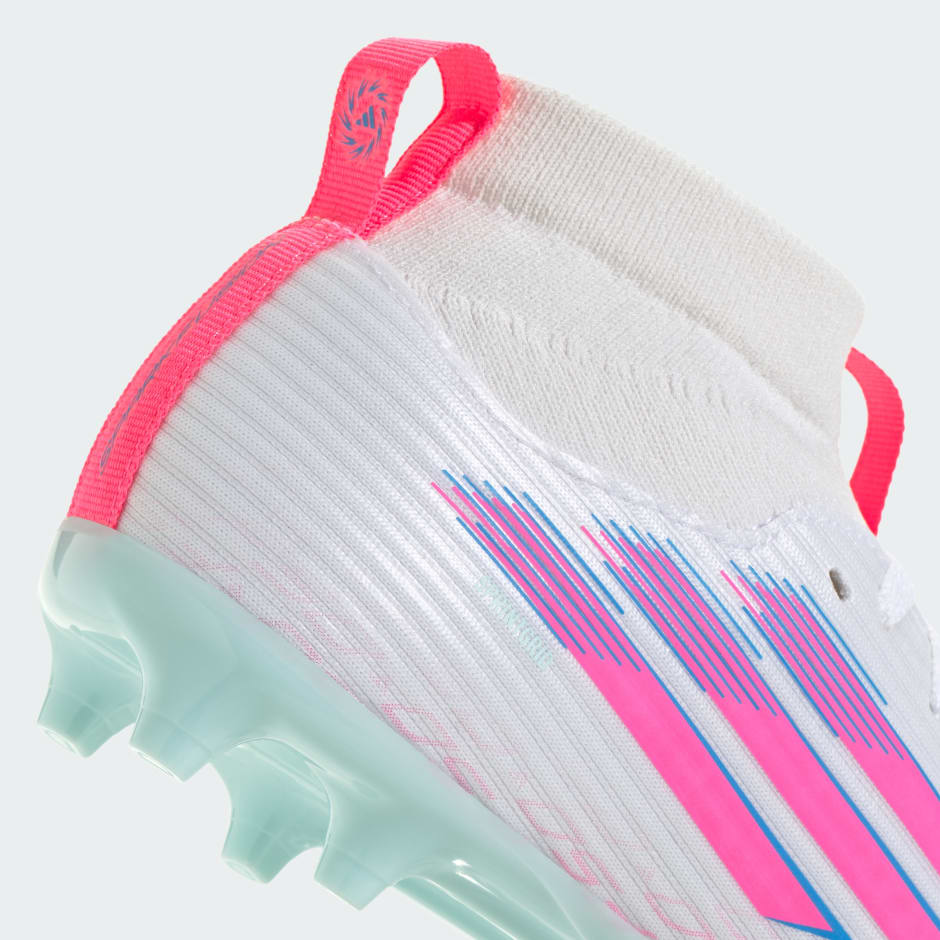 حذاء الأرضيات الصلبة/العشب الصناعي للأطفال F50 Sparkfusion League