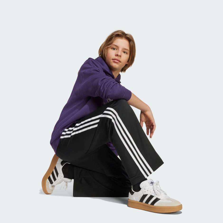 بنطال ADICOLOR للناشئين واسع FIREBIRD