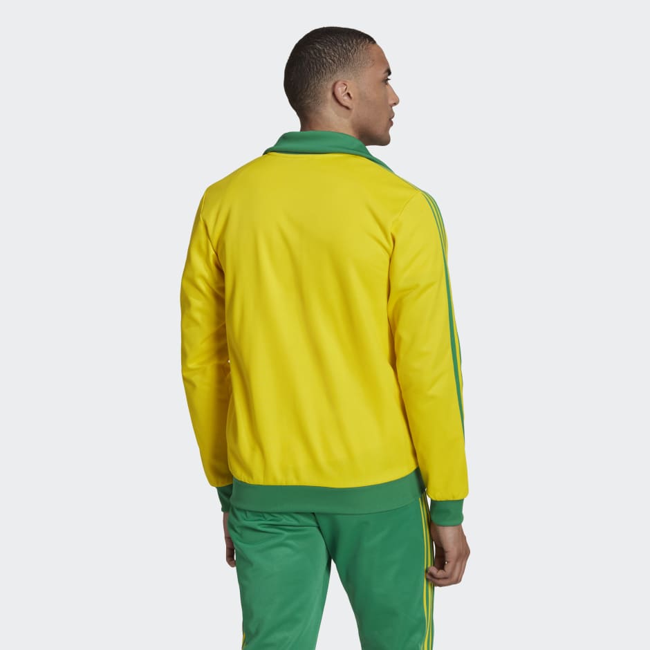 Buzo amarillo best sale adidas hombre