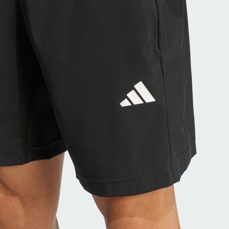 WORKOUT ESSENTIALS BASE WOVEN SHORT