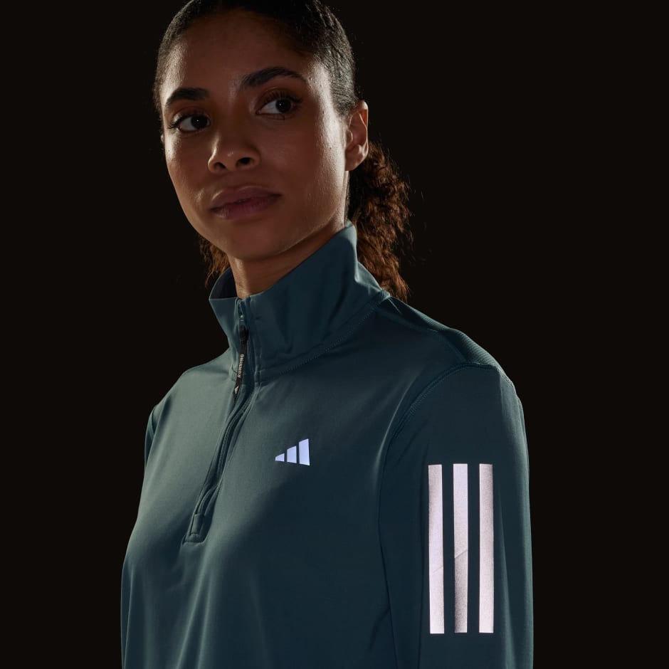 Jakna Own the Run s patentnim zatvaračem dijelom duljine