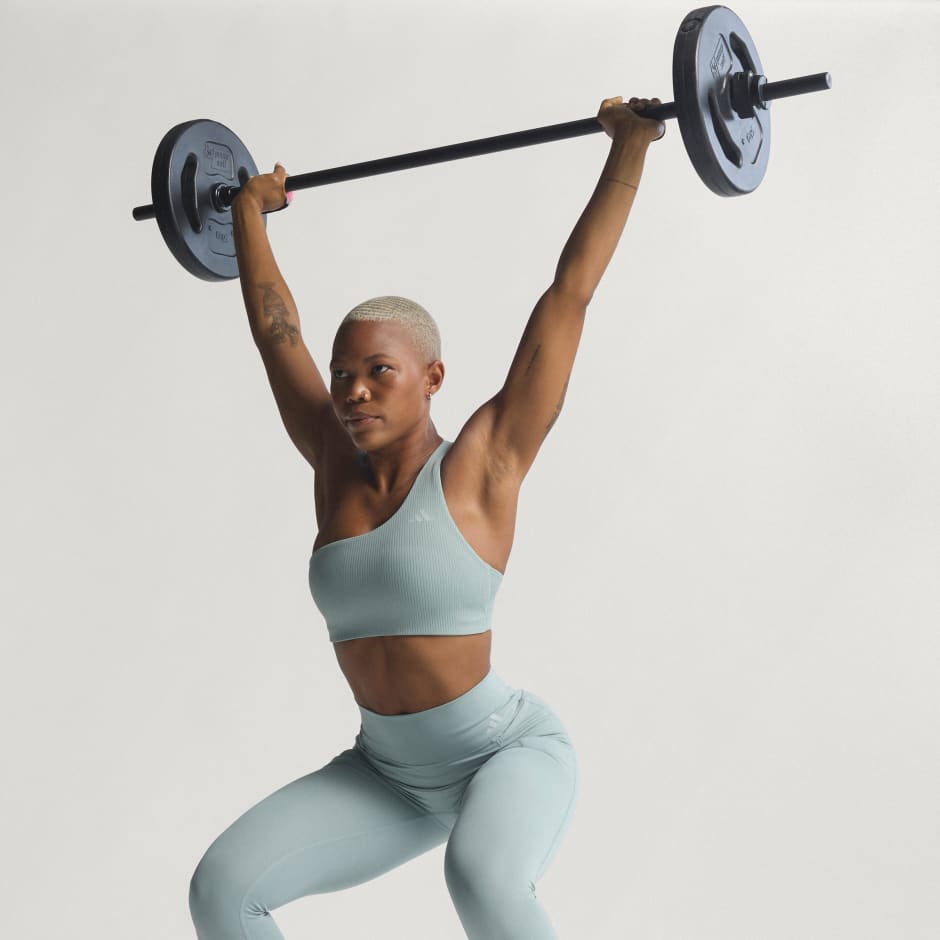 Sutien de antrenament Optime su striații, un umăr gol și susținere ușoară